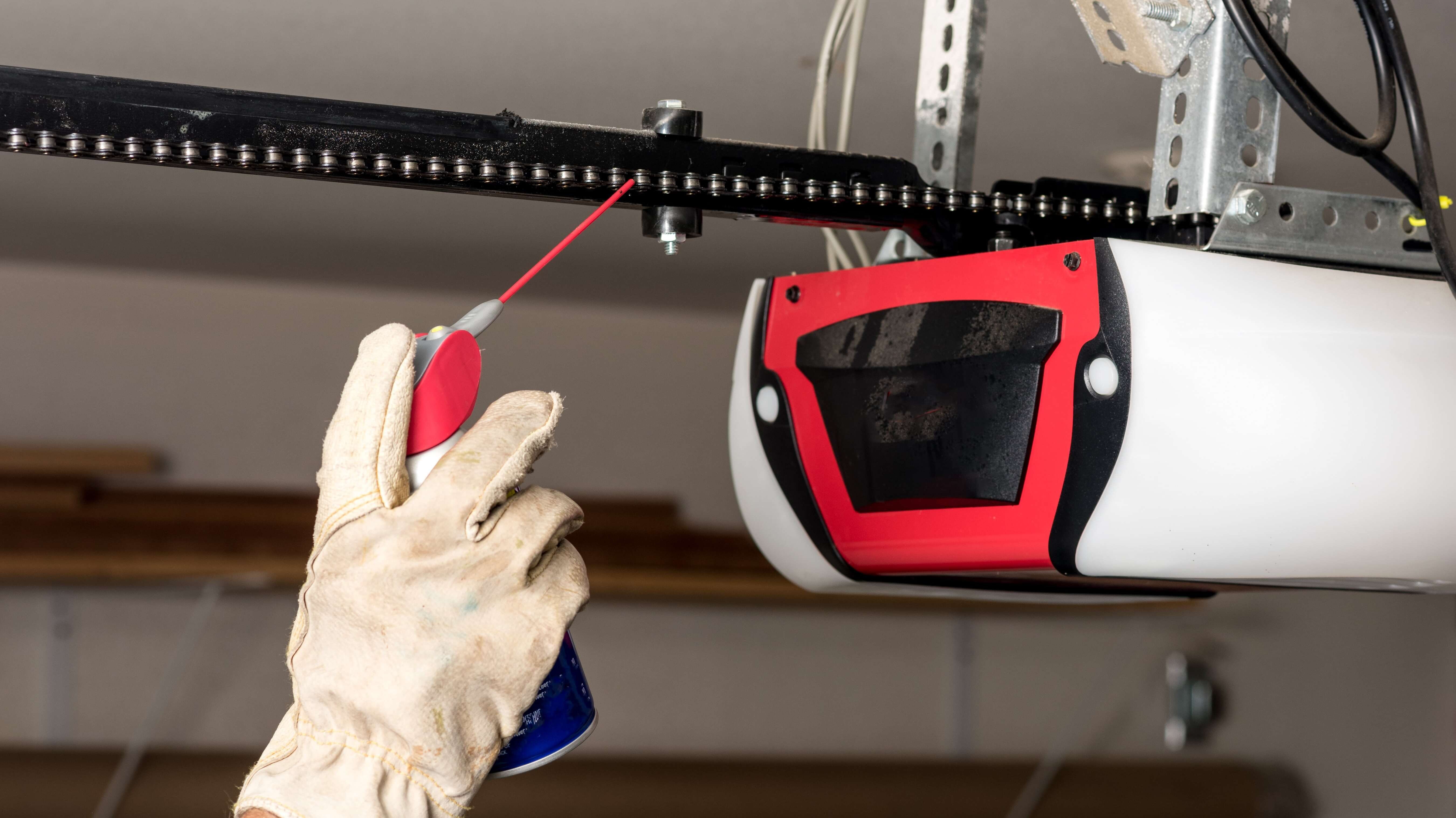 Chain-drive garage door opener repair and chain tension calibration in Cincinnati