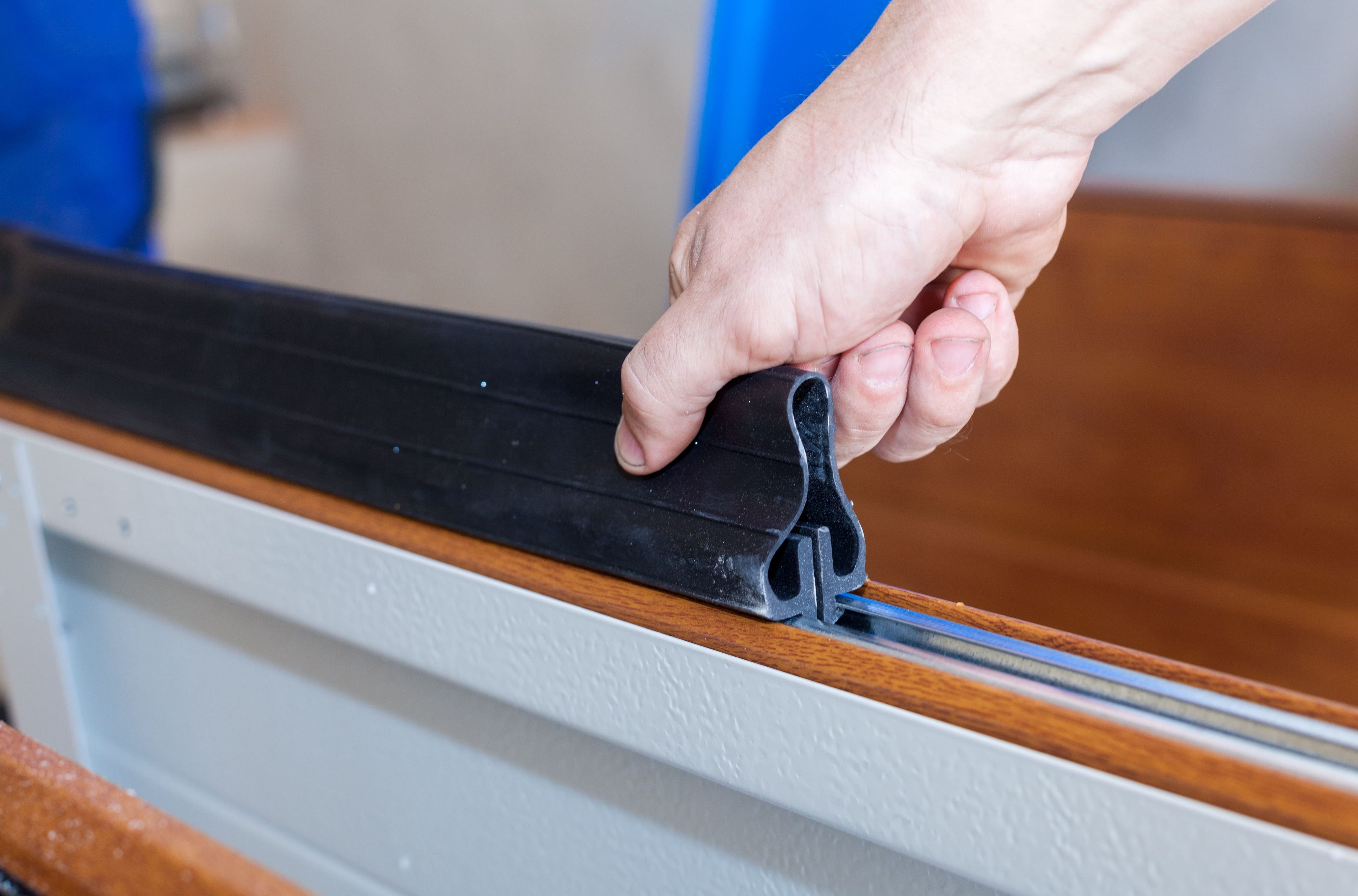 New bottom seal and weatherstripping installed on a garage door